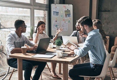 team-meeting-around-table-in-modern-office-1